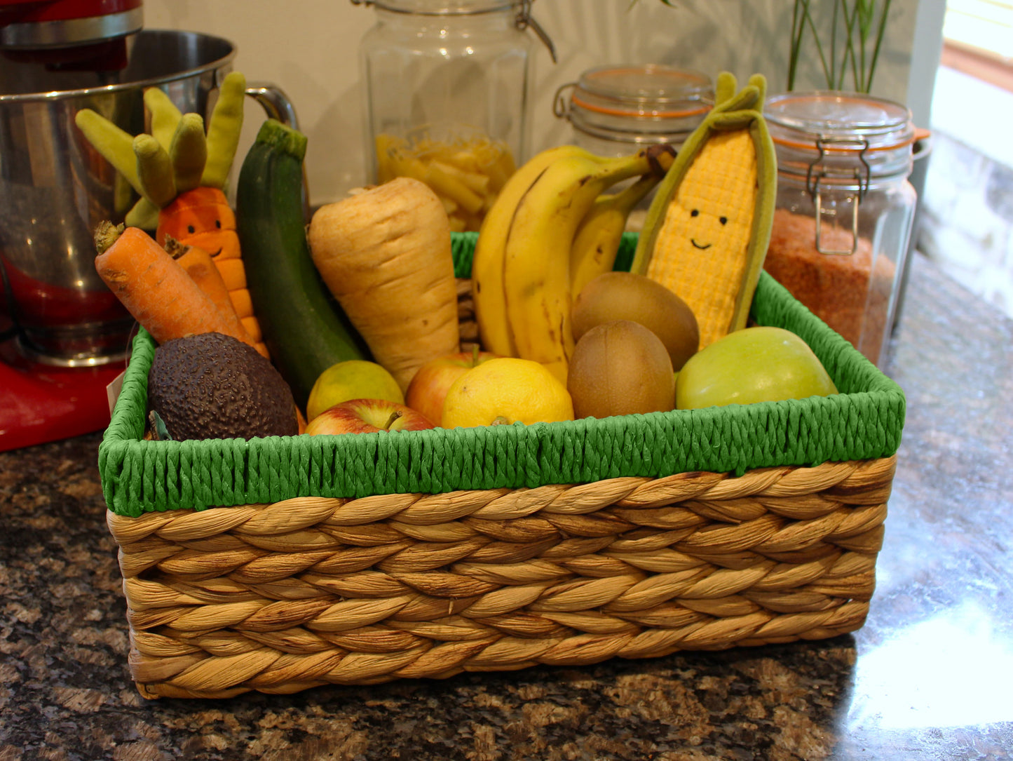 Small water hyacinth rectangular baskets with green edges.
