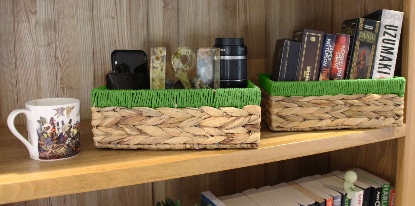 Small water hyacinth rectangular baskets with green edges.