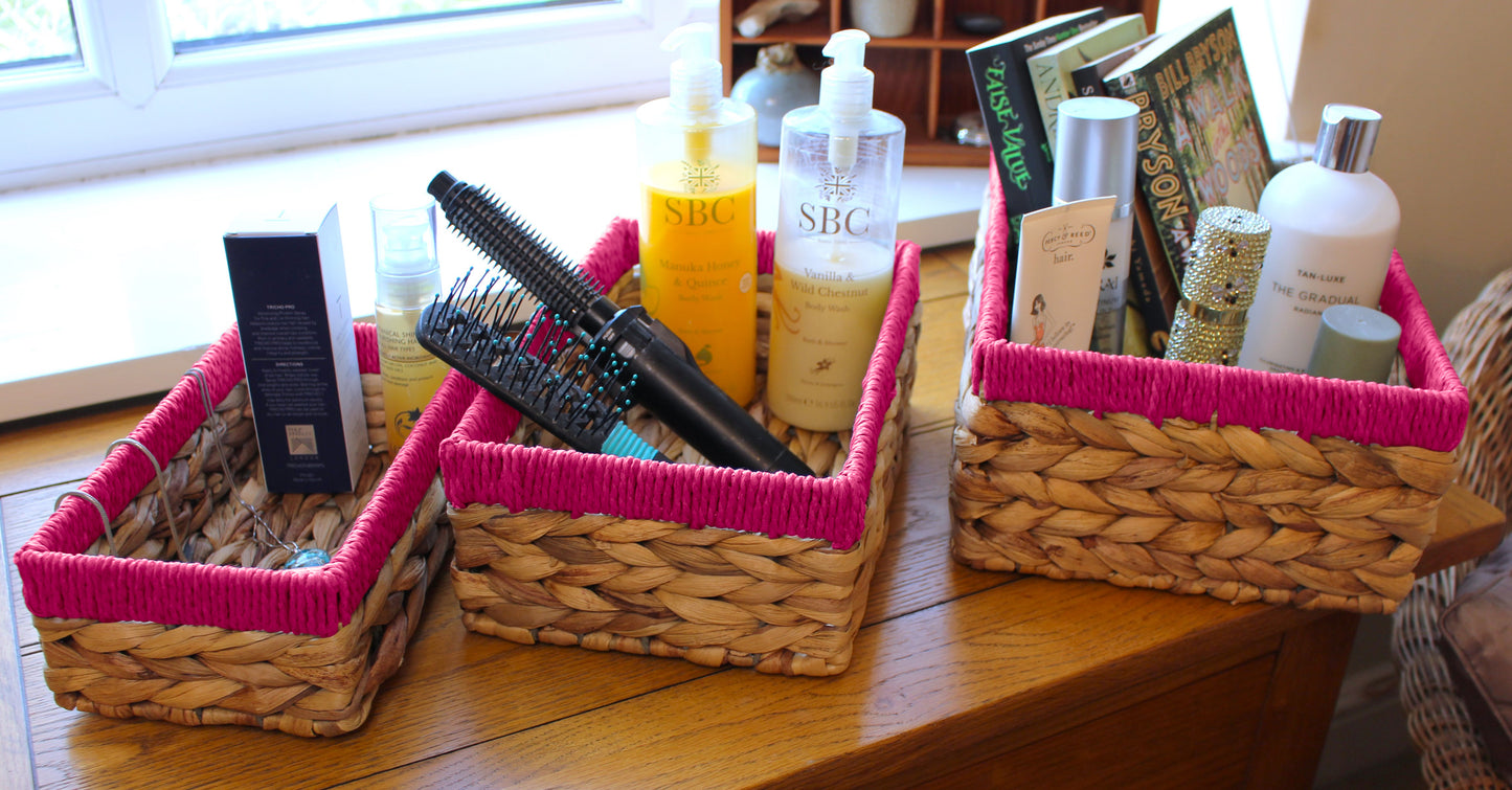 Small water hyacinth rectangular baskets with pink edges