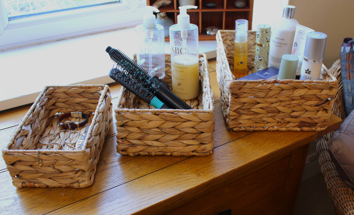 Small water hyacinth rectangular baskets in natural colour.