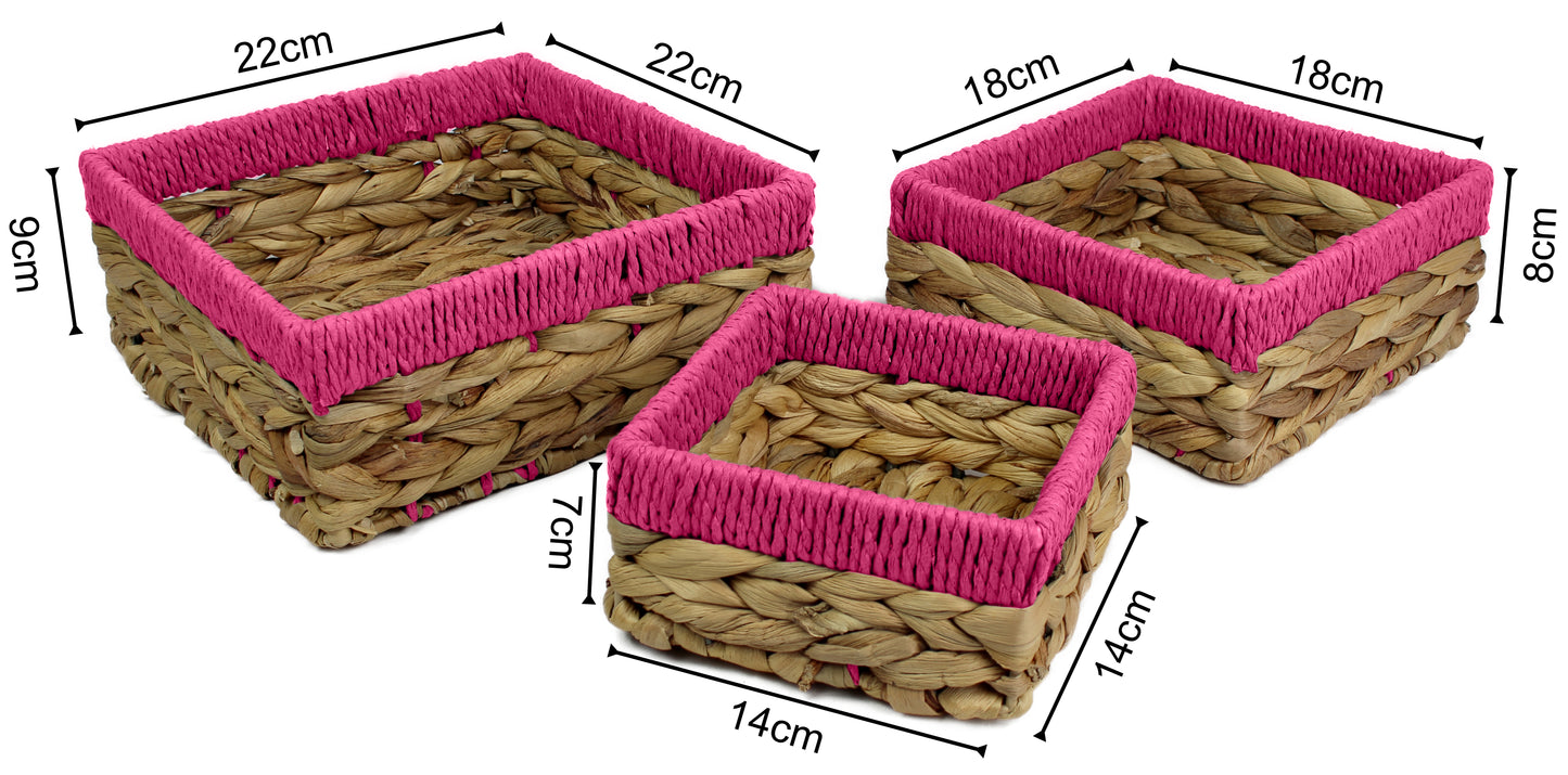 Small water hyacinth square baskets with pink edges.