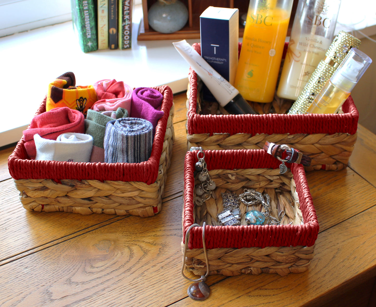 Small water hyacinth square baskets with red edges